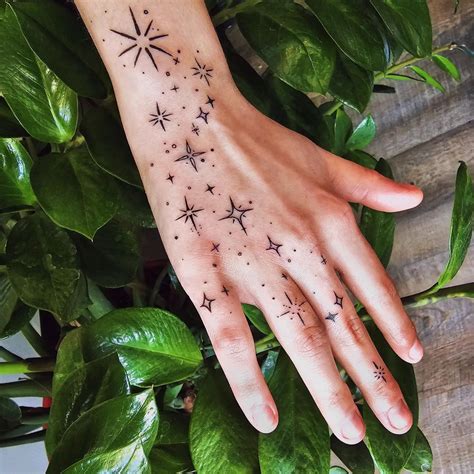 Celestial Hand Tattoo Design