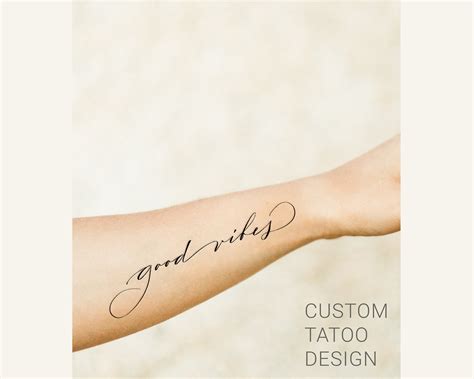 Cursive Design Tattoo